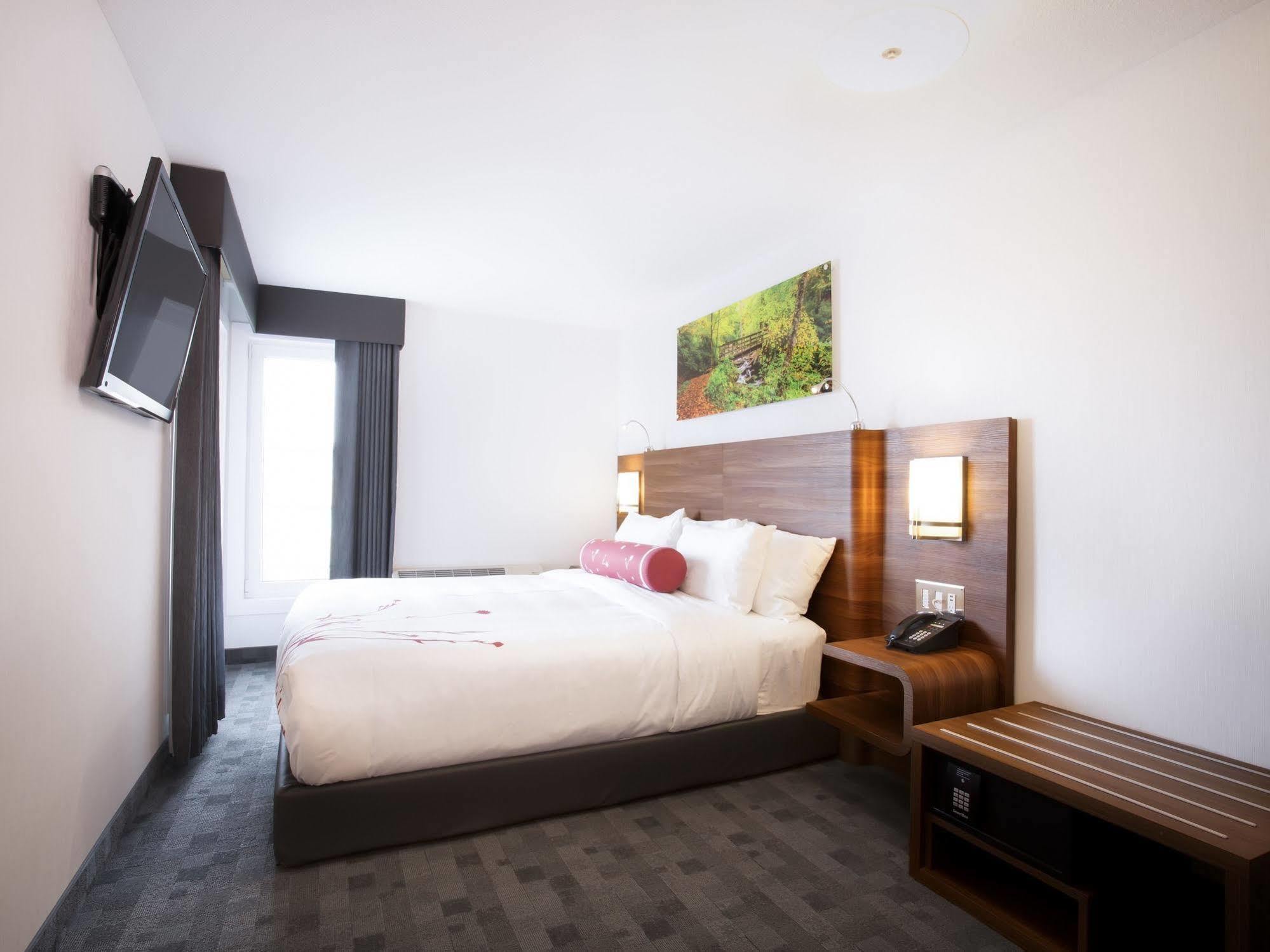 Hotel Elan Калгари Экстерьер фото